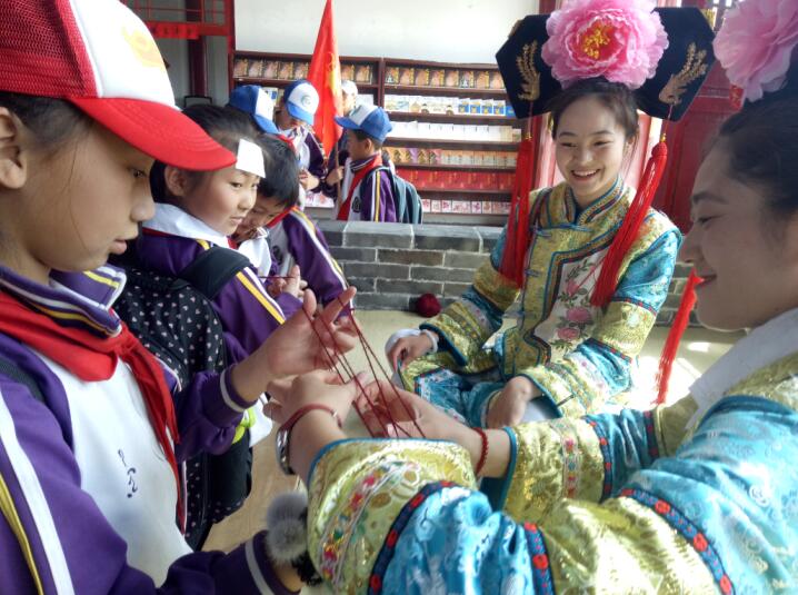 研学游—满族改绷